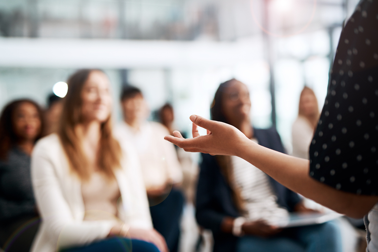 audience listening to a presenter