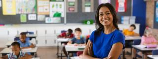 Teacher smiling in the elementary school classroom